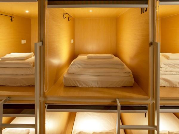 Yote 28 : photo 1 de la chambre lit simple dans dortoir pour hommes