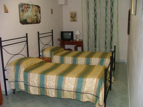 Hotel Alloggio Del Conte : photo 1 de la chambre chambre lits jumeaux