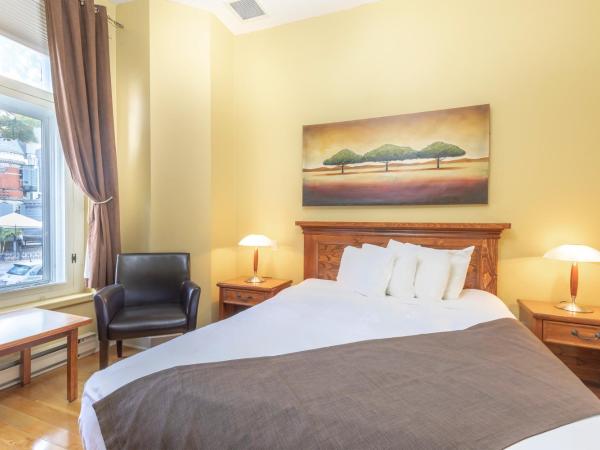 Unilofts Grande-Allée : photo 2 de la chambre chambre standard avec lit queen-size