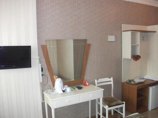 Tac Hotel : photo 1 de la chambre chambre quadruple