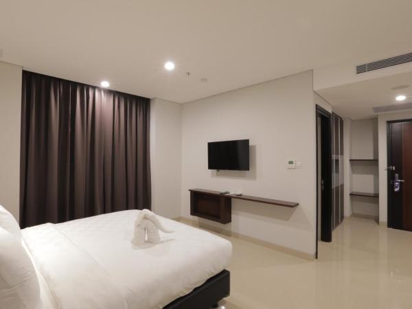 PrimeBiz Hotel Surabaya : photo 2 de la chambre chambre double deluxe
