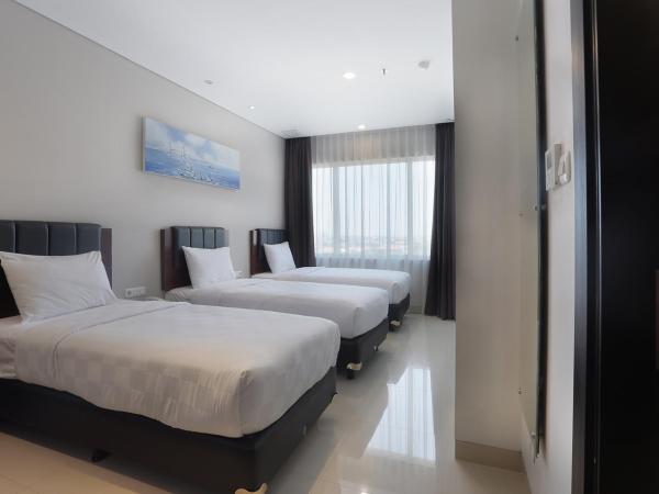 PrimeBiz Hotel Surabaya : photo 3 de la chambre chambre triple supérieure