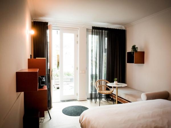 Fitz Roy Urban Hotel, Bar and Garden : photo 2 de la chambre chambre double avec patio