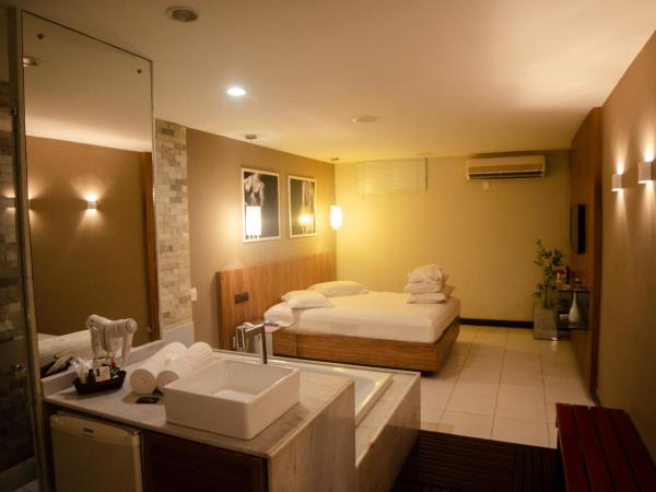 Status Motel : photo 1 de la chambre chambre double avec baignoire spa