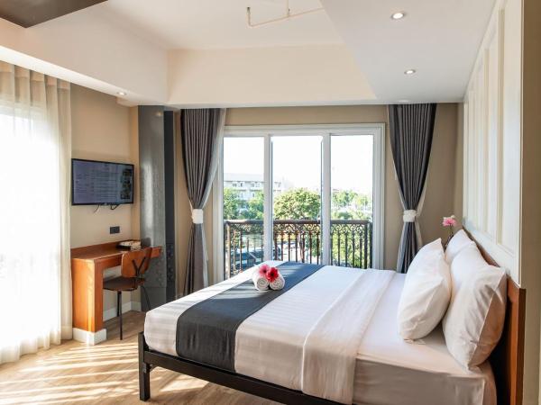 Dang Derm In The Park Khaosan : photo 2 de la chambre suite deluxe avec lit king-size