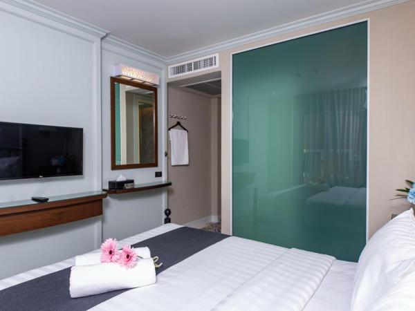 Dang Derm In The Park Khaosan : photo 3 de la chambre chambre lit king-size de luxe 