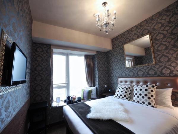 Ramada Hong Kong Grand : photo 1 de la chambre chambre deluxe double ou lits jumeaux