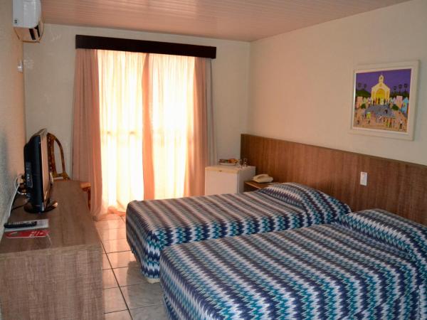Hotel Casa De Praia : photo 1 de la chambre chambre lits jumeaux
