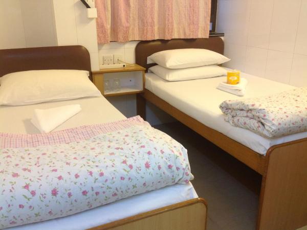 Holiday Guest House : photo 2 de la chambre chambre triple deluxe