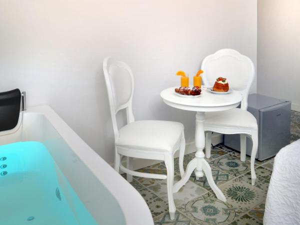 Barbarella Home : photo 9 de la chambre suite avec accès au spa