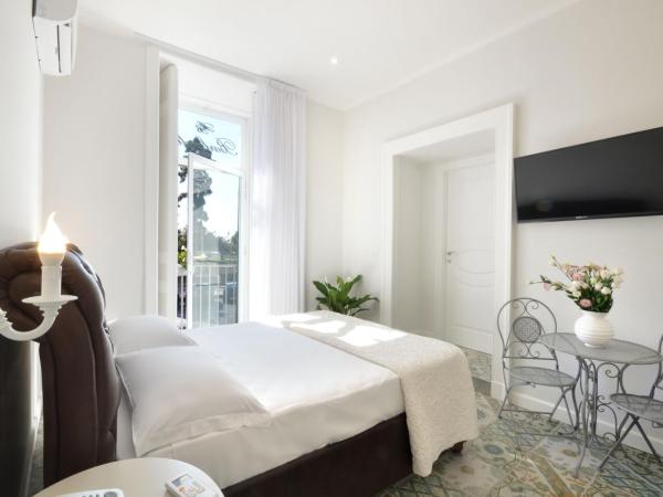 Barbarella Home : photo 1 de la chambre suite avec baignoire spa