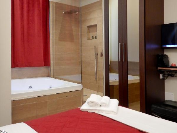 Arena Luxury Suite : photo 8 de la chambre chambre double ou lits jumeaux supérieure - vue sur jardin