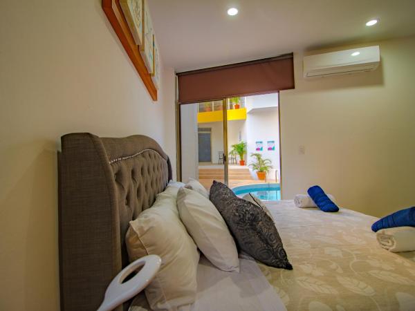 Sunset Isla Mujeres : photo 9 de la chambre appartement - vue sur mer