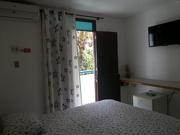 Hotel Pousada Estacao Do Sol Natal : photo 3 de la chambre chambre double ou lits jumeaux - vue latérale sur mer
