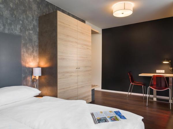 Signature East Hotel Apartment : photo 2 de la chambre chambre double avec lit queen-size