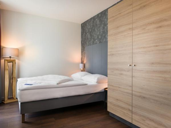Signature East Hotel Apartment : photo 3 de la chambre chambre double avec lit queen-size