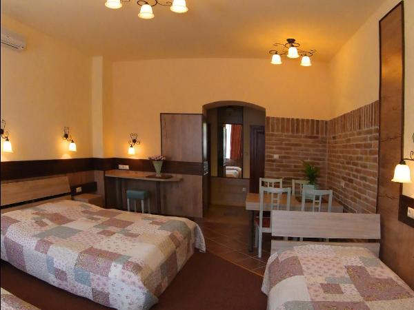 Família Vendégház : photo 1 de la chambre chambre quadruple