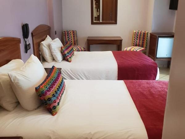 Hôtel Amouday : photo 4 de la chambre chambre lits jumeaux