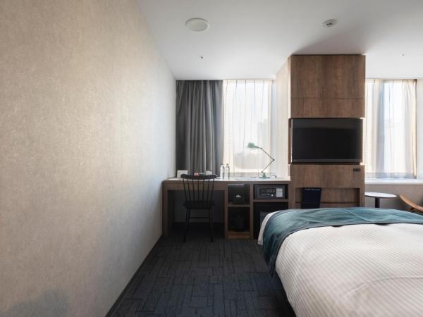 THE KNOT TOKYO Shinjuku : photo 5 de la chambre 30sqm extra large deluxe twin on the top floor - non-smoking