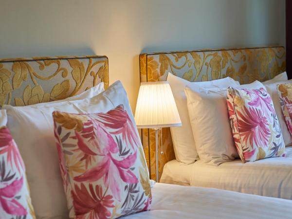 Antoinette Hotel Wimbledon : photo 2 de la chambre chambre lits jumeaux excutive avec 2 lits doubles