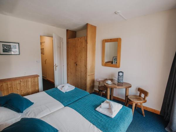 La Taverne : photo 1 de la chambre chambre lits jumeaux