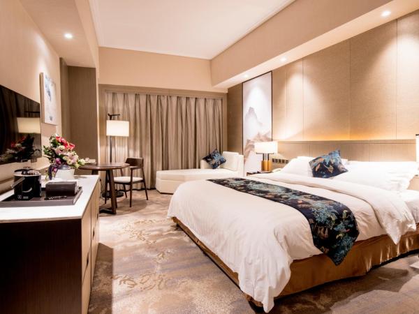 Jin Jiang Pine City Hotel : photo 1 de la chambre chambre double deluxe