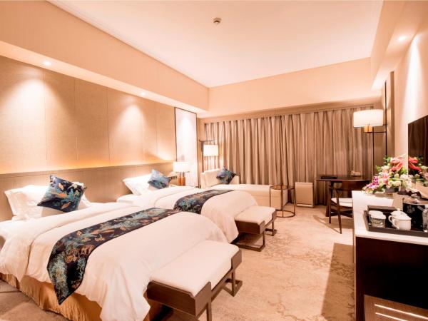 Jin Jiang Pine City Hotel : photo 1 de la chambre chambre lits jumeaux de luxe avec vue