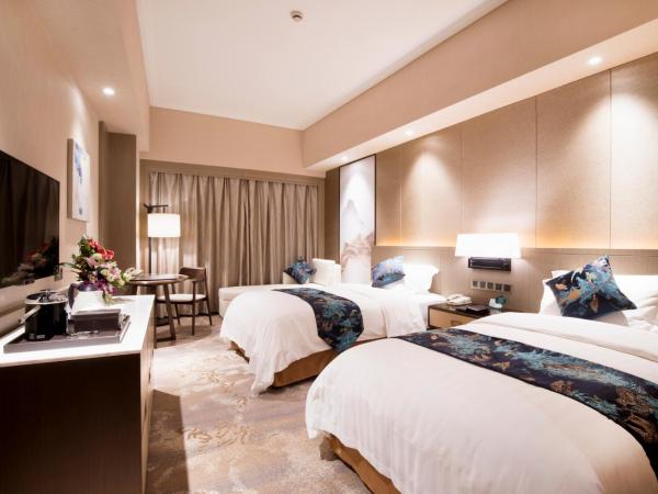 Jin Jiang Pine City Hotel : photo 1 de la chambre chambre lits jumeaux deluxe