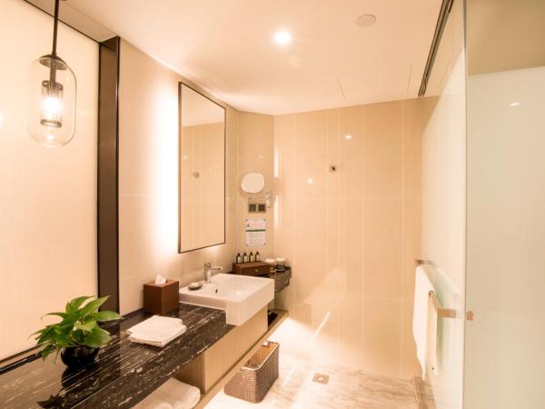 Jin Jiang Pine City Hotel : photo 4 de la chambre chambre exécutive lit queen-size