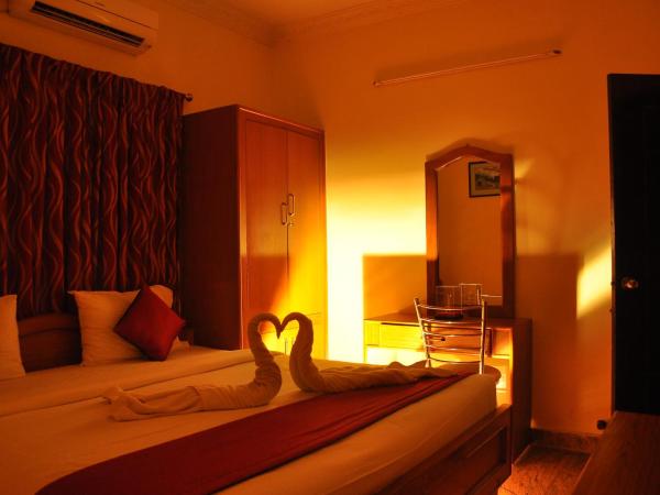 Green Grande Inn : photo 1 de la chambre chambre double deluxe