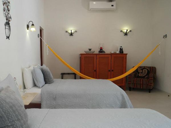 Merida Santiago Hotel Boutique : photo 5 de la chambre suite avec baignoire spa - vue sur piscine