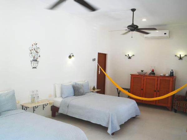 Merida Santiago Hotel Boutique : photo 6 de la chambre suite avec baignoire spa - vue sur piscine