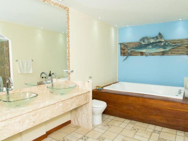 Pousada La Dolce Vita : photo 1 de la chambre suite principale avec salle de bains