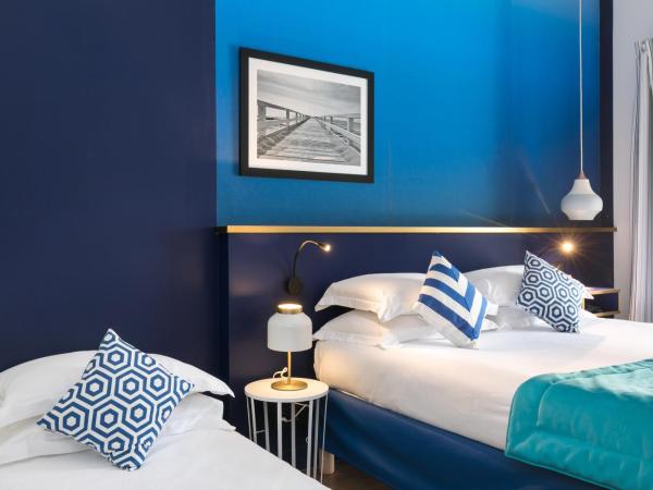 The Deck Hotel by Happyculture : photo 3 de la chambre chambre triple premium