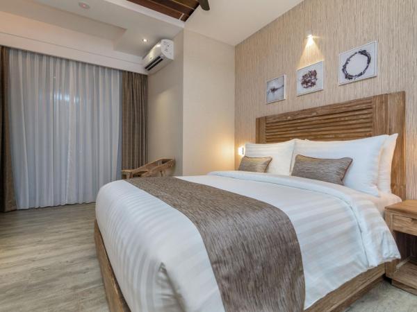 Samann Grand : photo 10 de la chambre hébergement double super deluxe avec balcon - vue sur océan (navette aéroport aller-retour gratuite)