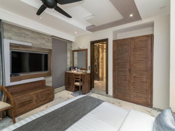 Samann Grand : photo 8 de la chambre suite exécutive avec balcon - navette aéroport aller-retour gratuite