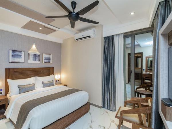 Samann Grand : photo 5 de la chambre suite exécutive avec balcon - navette aéroport aller-retour gratuite