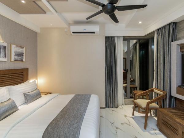 Samann Grand : photo 6 de la chambre suite exécutive avec balcon - navette aéroport aller-retour gratuite