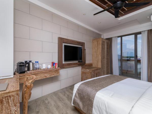 Samann Grand : photo 8 de la chambre hébergement double super deluxe avec balcon - vue sur océan (navette aéroport aller-retour gratuite)