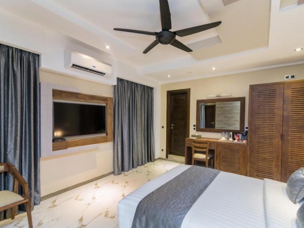 Samann Grand : photo 9 de la chambre suite samann avec balcon (navette aéroport aller-retour gratuite)