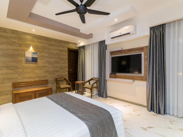 Samann Grand : photo 10 de la chambre suite samann avec balcon (navette aéroport aller-retour gratuite)