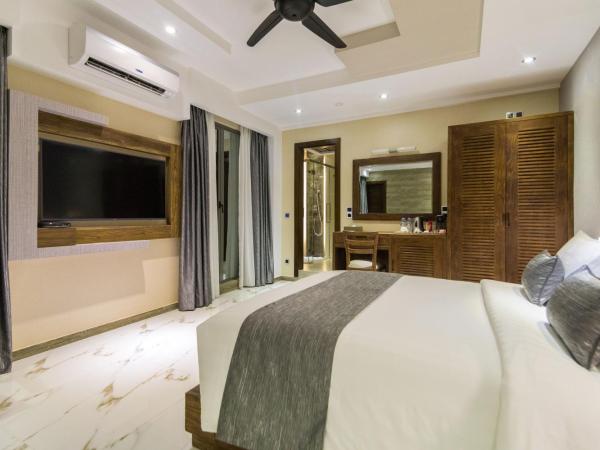 Samann Grand : photo 8 de la chambre suite samann avec balcon (navette aéroport aller-retour gratuite)