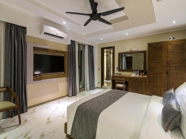 Samann Grand : photo 7 de la chambre suite samann avec balcon (navette aéroport aller-retour gratuite)