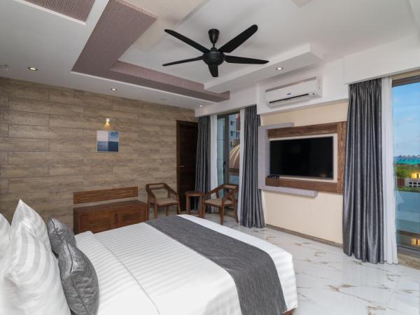 Samann Grand : photo 6 de la chambre suite samann avec balcon (navette aéroport aller-retour gratuite)