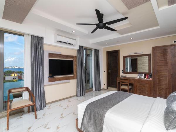 Samann Grand : photo 5 de la chambre suite samann avec balcon (navette aéroport aller-retour gratuite)