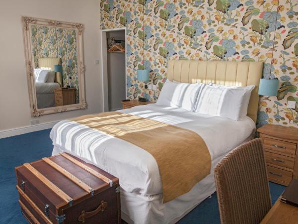 The Blue Piano Guesthouse : photo 1 de la chambre chambre lit king-size