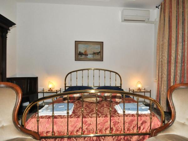 Locazione Turistica Poker d'assi : photo 4 de la chambre chambre double avec salle de bains commune