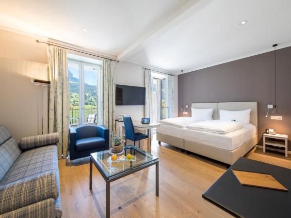 Belvedere Swiss Quality Hotel : photo 1 de la chambre chambre triple classique avec climatisation - vue sur eiger