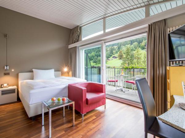 Belvedere Swiss Quality Hotel : photo 2 de la chambre chambre double standard - climatisation - vue sur jardin