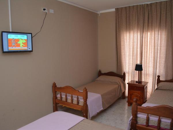 Hotel Isella : photo 4 de la chambre chambre quadruple de luxe